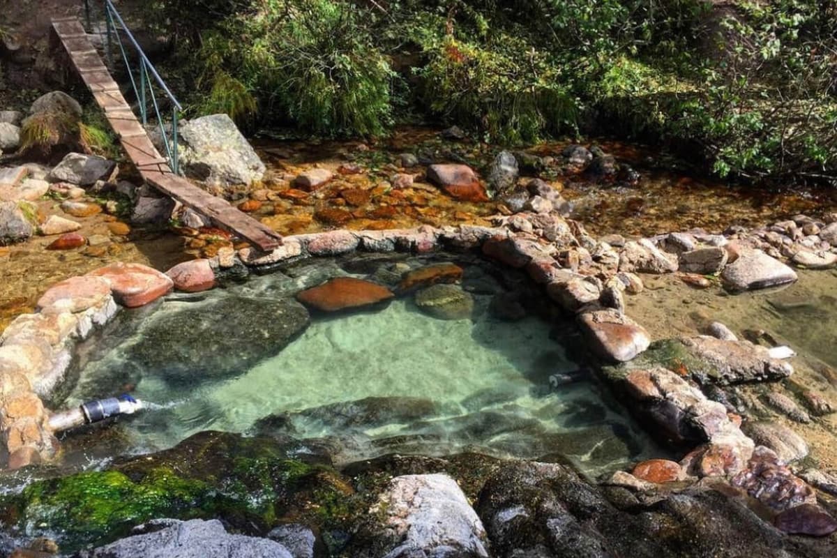 River winding through forested mountains near Cascade, Idaho, where natural hot springs are tucked along the creeks